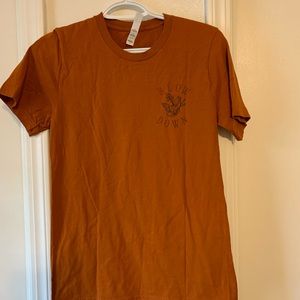 Terra cotta colored slow down floral t shirt